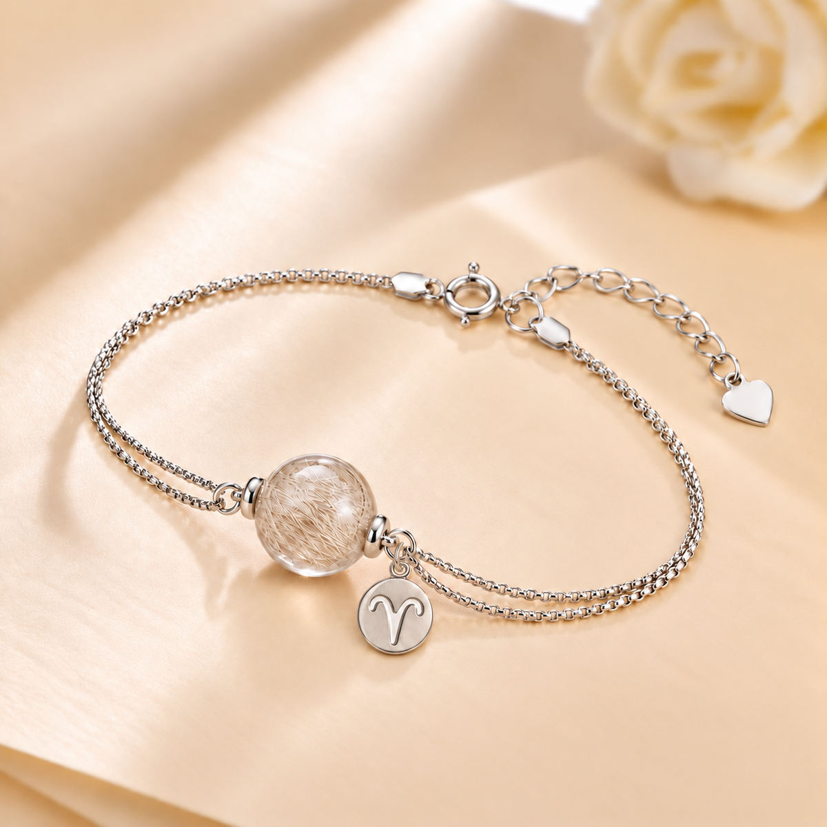 Model wearing the Toujours Zodiac Companion Charm silver pet keepsake charm