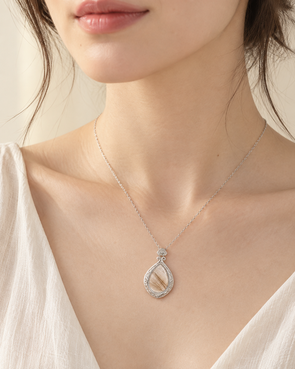 Model wearing the Toujours Princess silver pet keepsake necklace
