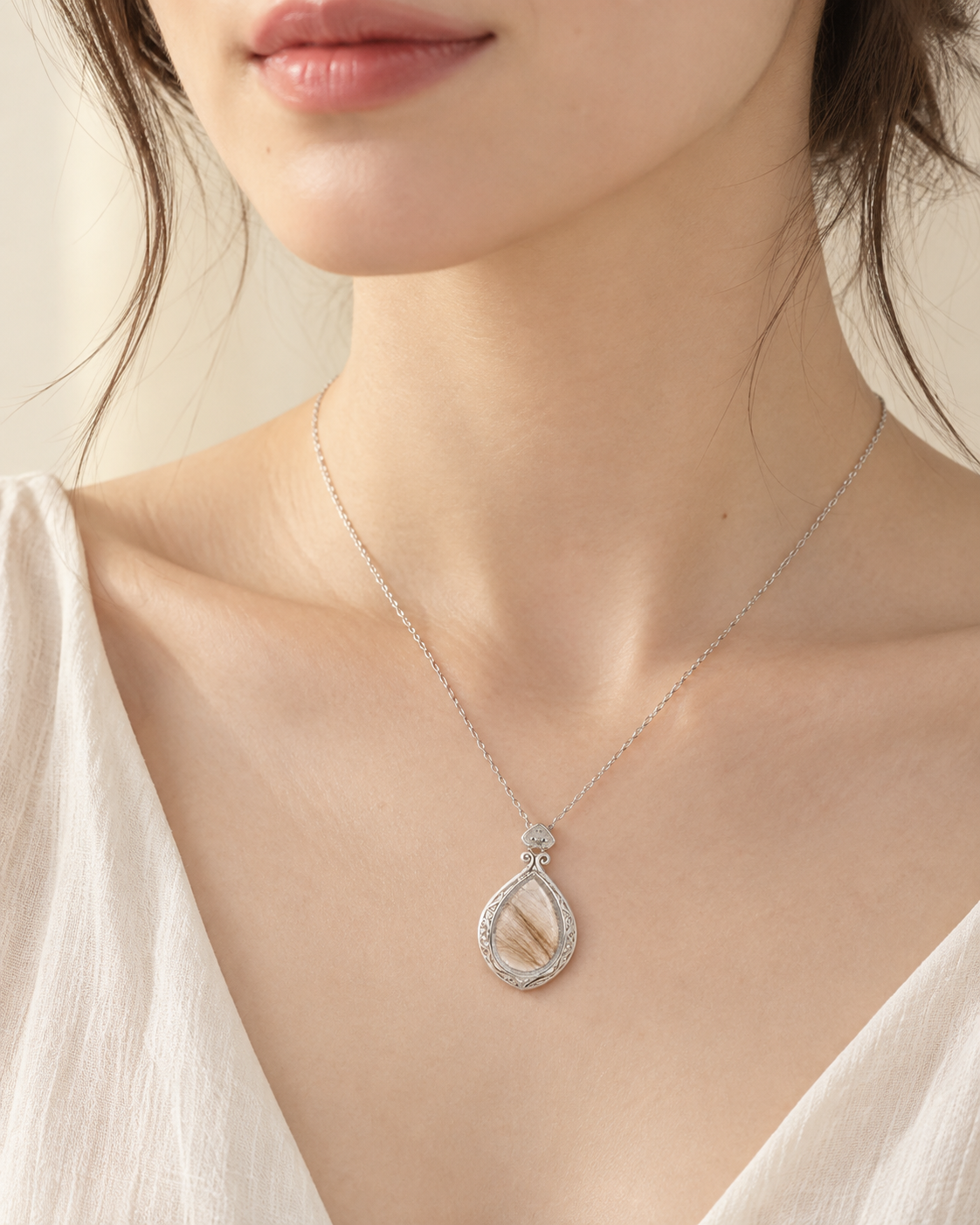 Model wearing the Toujours Princess silver pet keepsake necklace