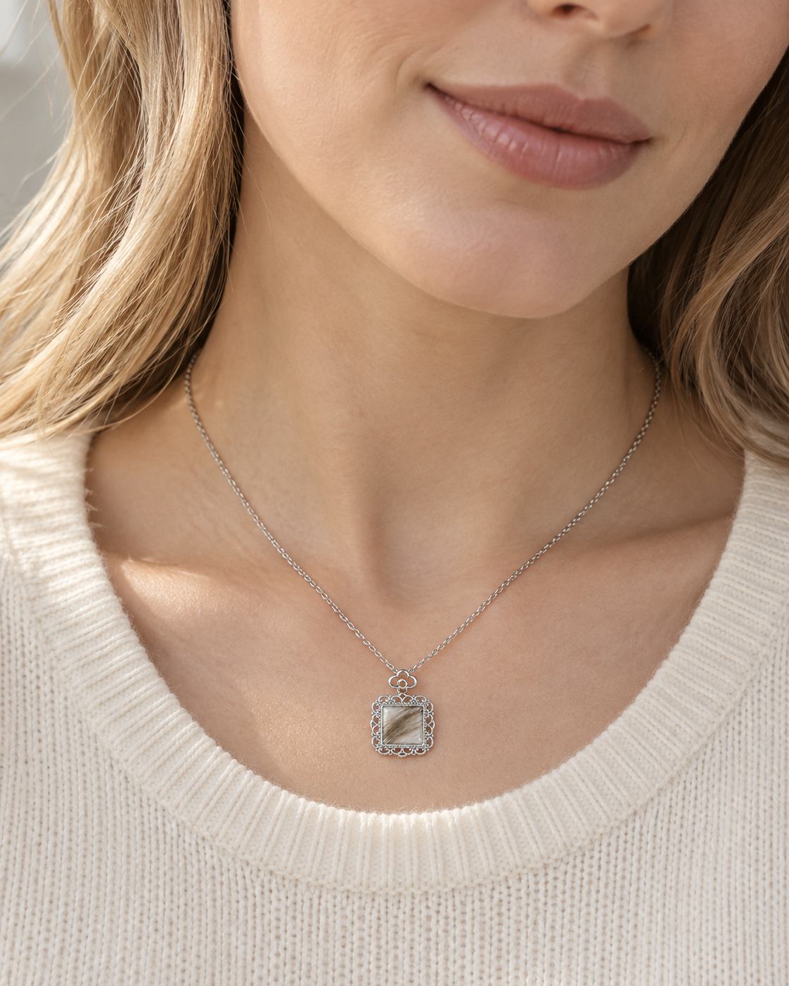 Model wearing the Toujours Reflection silver pet keepsake necklace